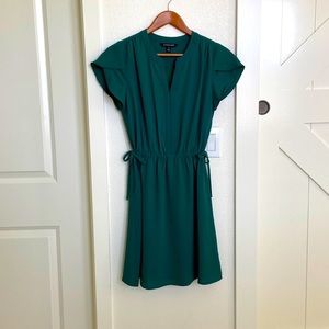 Emerald green tulip-sleeve dress. Size extra small.